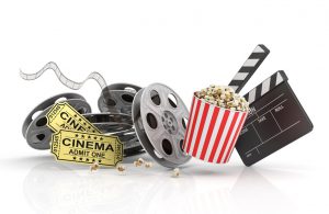 Film Reels, tickets and clapper board.